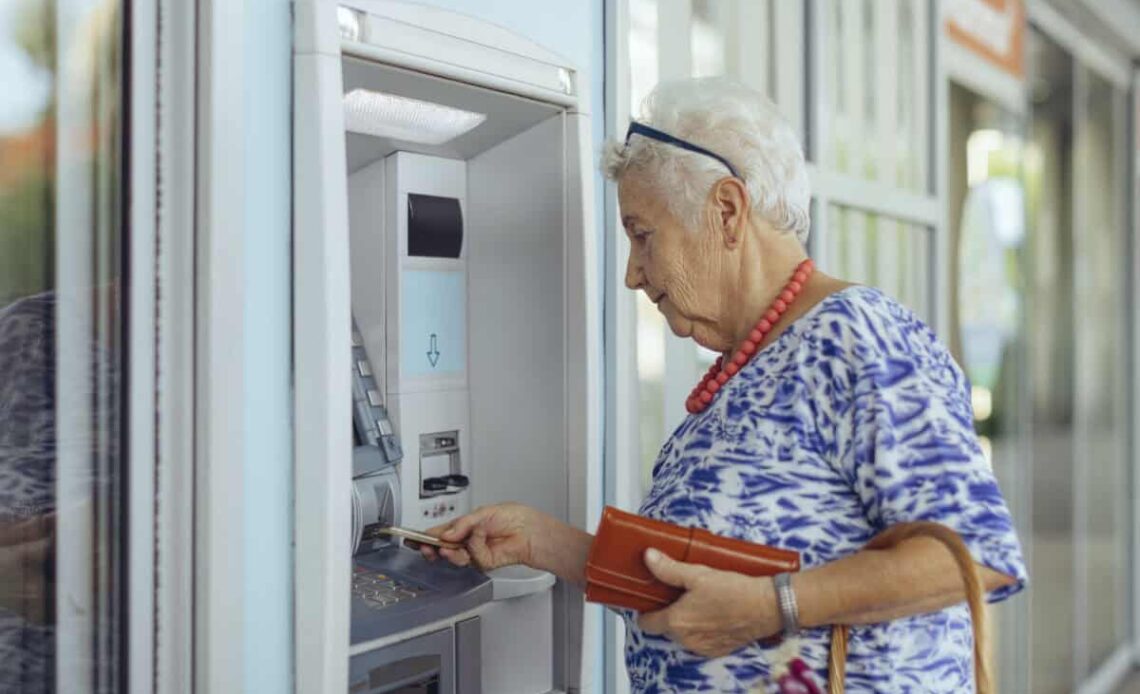 customer uses bank ATM